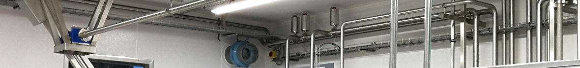 A white room with technical equipment made from stainless steel