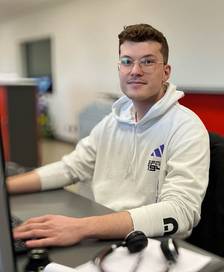 Michael at an office workplace